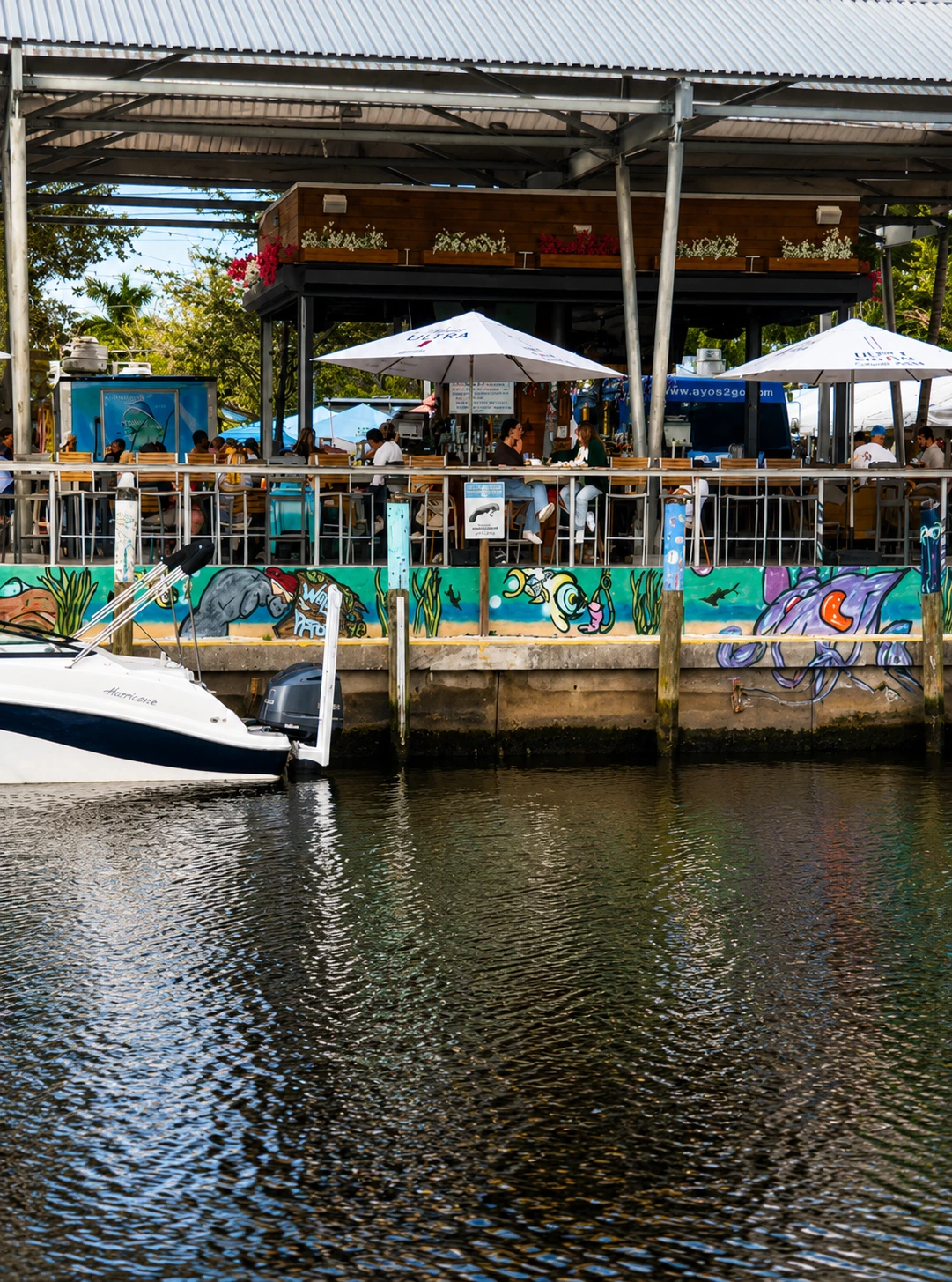 Cocktail with Naples waterfront and ocean views at Celebration Park